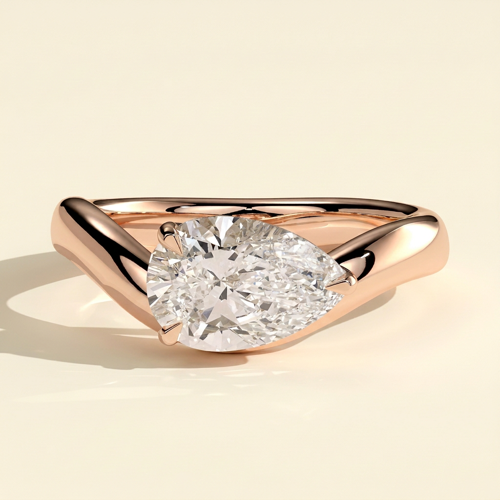 The Celina - Pear Cut Lab Grown Diamond East West Solitaire with Wave Band Engagement Ring