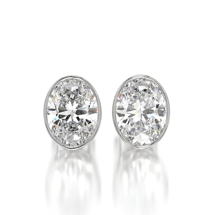 0.50 CTW Oval Lab Grown Diamond Bezel Stud Earrings Set - Yellow Gold