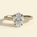 The Risela - Oval Cut Lab Grown Diamond Four Claw Solitaire with Hidden Halo and Cathedral Pave Band Engagement Ring