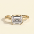 The Mara - Emerald Cut Lab Grown Diamond East West Half Bezel Solitaire Engagement Ring