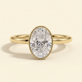 The Uriela - Oval Cut Lab Grown Diamond Bezel Set Solitaire Engagement Ring