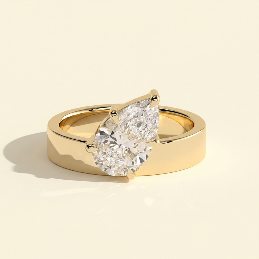 The Carina - Pear Cut Lab Grown Diamond Offset Angled Solitaire with Flat Cigar Band Engagement Ring - Yellow Gold