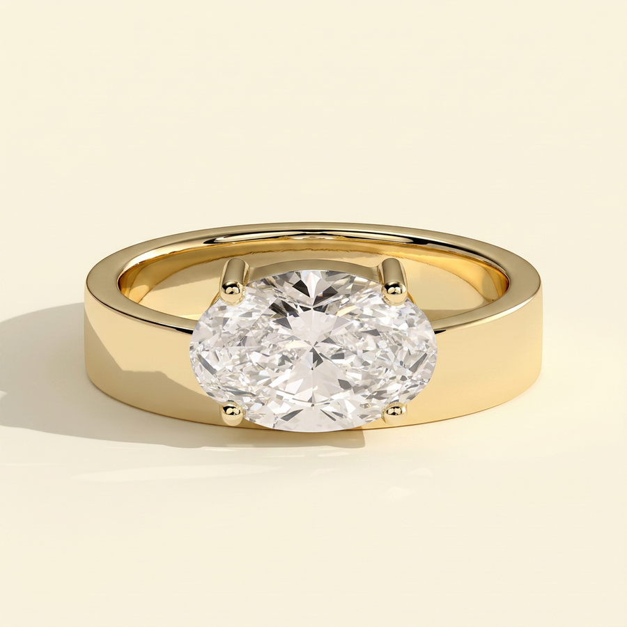 The Sella - Oval Cut Lab Grown Diamond East West Offset Solitaire with Flat Cigar Band Engagement Ring - Yellow Gold
