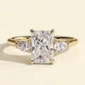 The Mirabel - Radiant Cut Lab Grown Diamond Three Stone Engagement Ring with Pear Side Stones