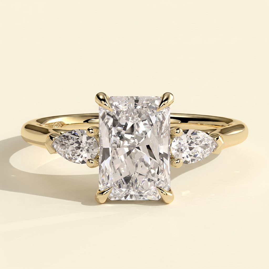 The Mirabel - Radiant Cut Lab Grown Diamond Three Stone Engagement Ring with Pear Side Stones