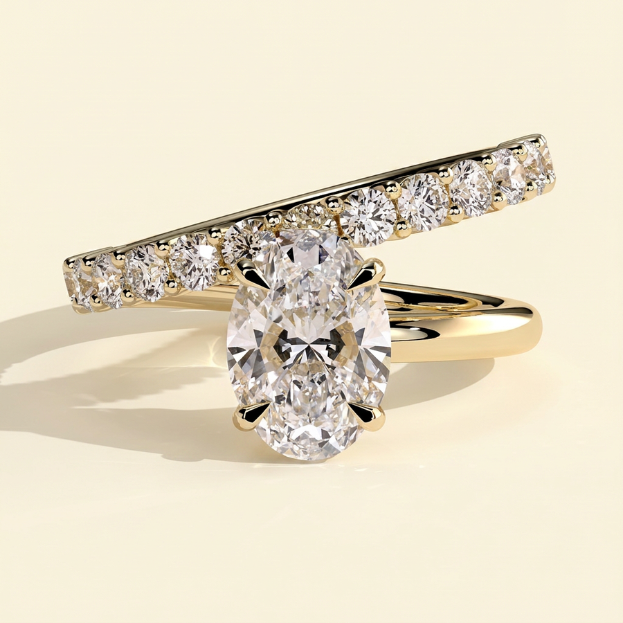 The Veora - Oval Cut Lab Grown Diamond Solitaire with Angled Pave Band and a Half Engagement Ring - Yellow Gold
