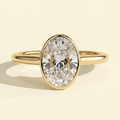 The Faina - Oval Cut Lab Grown Diamond Bezel Set Twisted Cathedral Engagement Ring