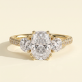 The Ivara - Elongated Cushion Cut Lab Grown Diamond Double Claw Three Stone with Pave Band and Cathedral Setting Engagement Ring
