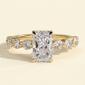 The Celia - Radiant Cut Lab Grown Diamond Four Claw Hidden Halo with Round Side Stones Engagement Ring