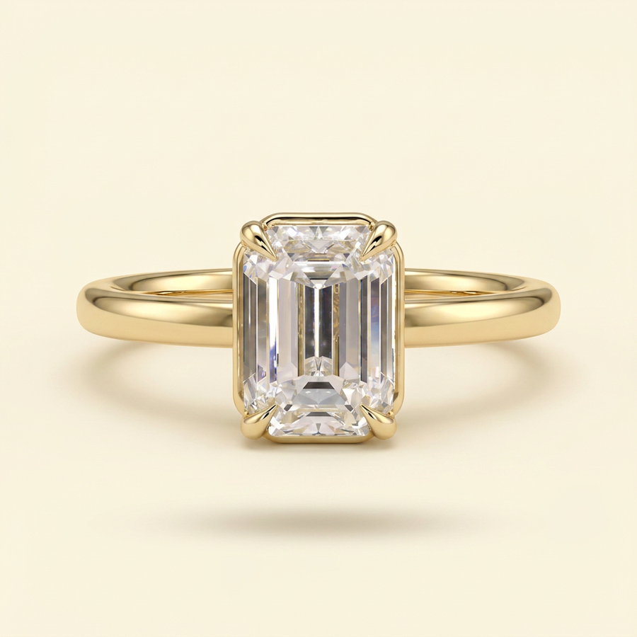 The Coralie - Emerald Cut Lab Grown Diamond Low Set Solitaire with Bezel Frame Engagement Ring - Yellow Gold
