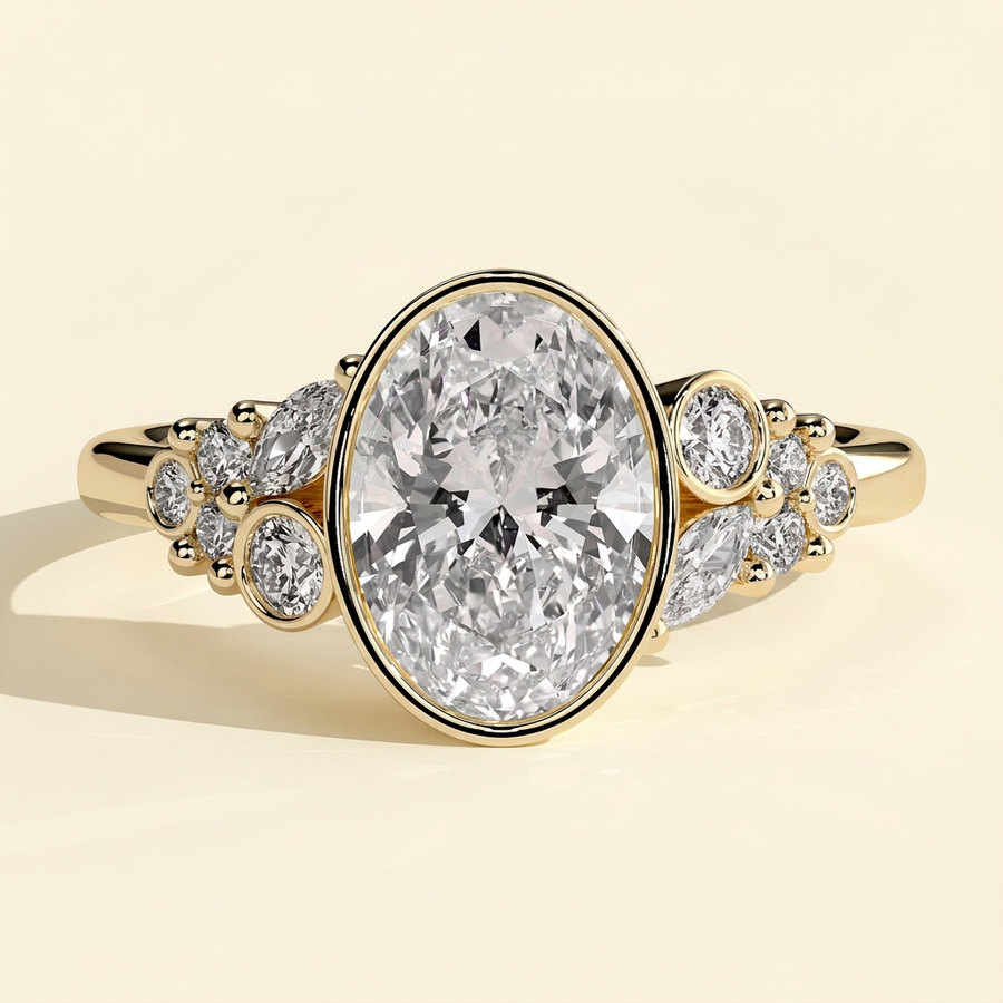 The Gemelle - Oval Cut Lab Grown Diamond Bezel Set Engagement Ring with Clustered Shoulder Accents - Yellow Gold