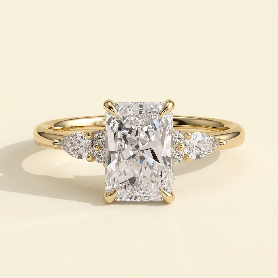 The Raina - Radiant Cut Lab Grown Diamond Three Stone Tulip Gallery Ring with Pear Side Stones - Yellow Gold