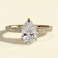 The Hestia - Pear Cut Lab Grown Diamond Wrap Around Hidden Halo Solitaire with Pave Band Engagement Ring