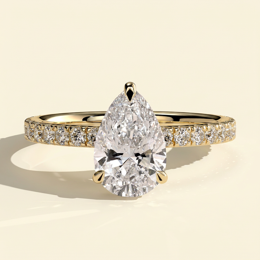 The Hestia - Pear Cut Lab Grown Diamond Wrap Around Hidden Halo Solitaire with Pave Band Engagement Ring - Yellow Gold