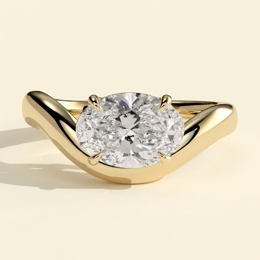The Rhea - Oval Cut Lab Grown Diamond East West Solitaire Engagement Ring with Wave Band - Yellow Gold