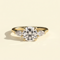 The Aurine - Round Cut Lab Grown Diamond Three Stone Ring with Pear Sides