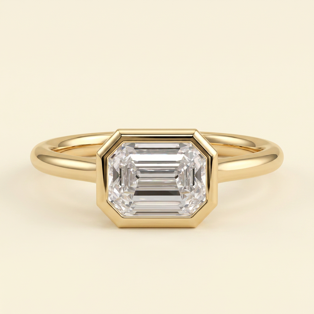 The Zaia - Emerald Cut Lab Grown Diamond East West Bezel Set Solitaire with Open Cathedral Setting Engagement Ring