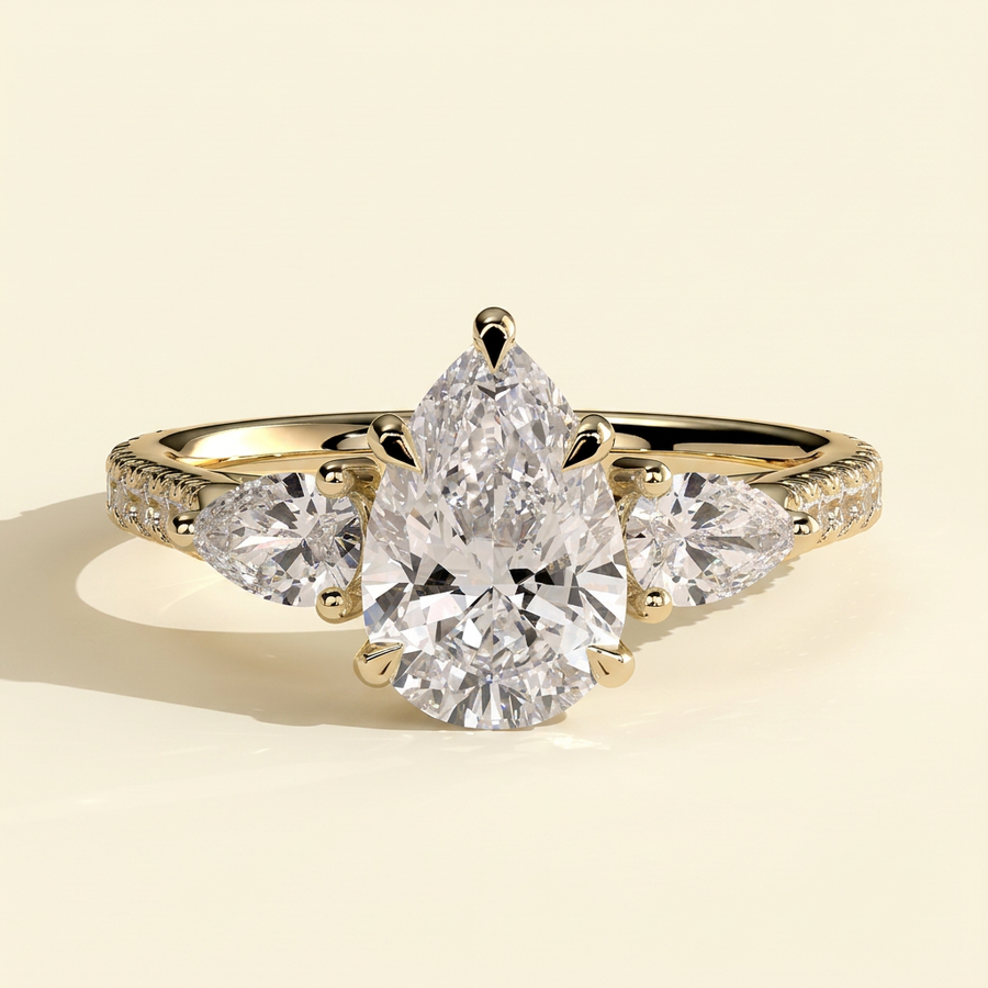 The Sirena - Pear Cut Lab Grown Diamond Three Stone with Pear Side Stones and Cathedral High Setting Engagement Ring - Yellow Gold