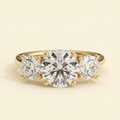 The Soline - Round Cut Lab Grown Diamond Claw Set Three Stone with Round Side Stones Engagement Ring