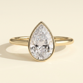 The Delphi - Pear Cut Lab Grown Diamond Bezel Set Cathedral Solitaire Engagement Ring