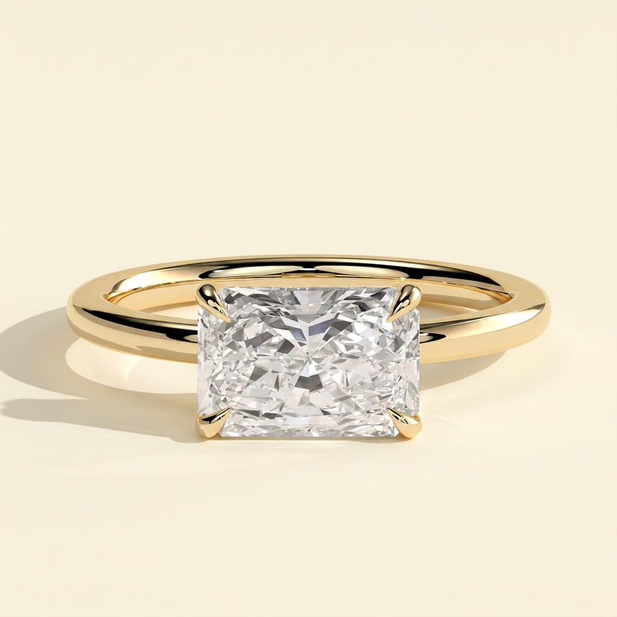 The Ovelle - Radiant Cut Lab Grown Diamond East West Solitaire with Raised Basket Gallery Engagement Ring - Yellow Gold