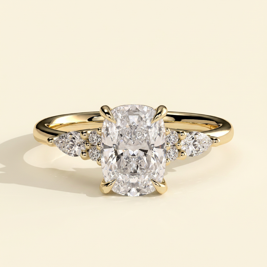 The Verelle - Elongated Cushion Cut Lab Grown Diamond Three Stone Engagement Ring with Pear and Round Side Stones - Yellow Gold