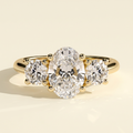 The Gemma - Oval Cut Lab Grown Diamond Three Stone Engagement Ring with Round Side Stones