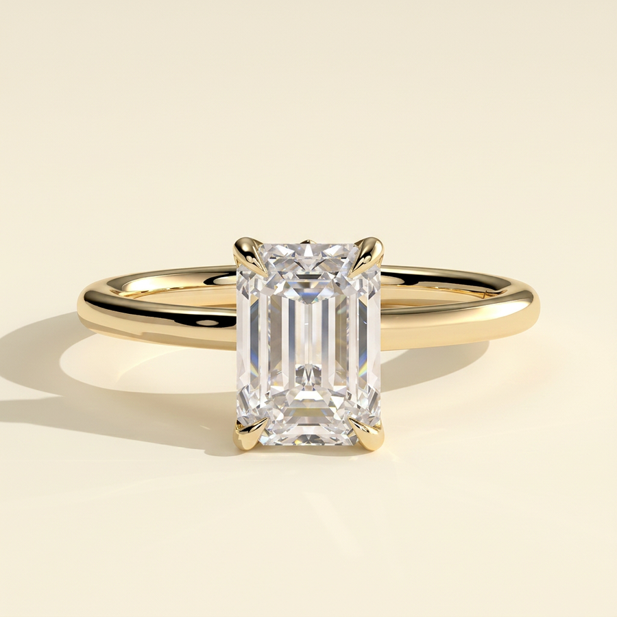 The Luvelle - Emerald Cut Lab Grown Diamond Claw Solitaire with Petal Gallery and Accent Leaf Detail Engagement Ring - Yellow Gold