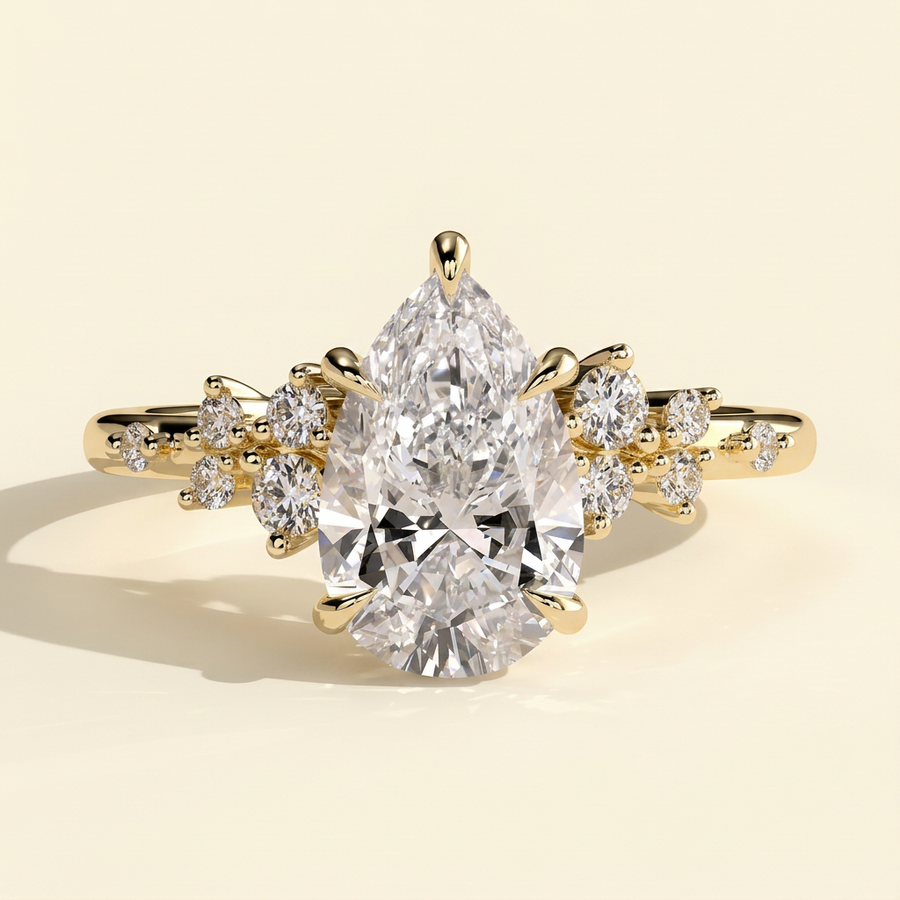 The Zivelle - Pear Cut Lab Grown Diamond Basket Set Solitaire with Clustered Round Shoulder Stones Engagement Ring - Yellow Gold