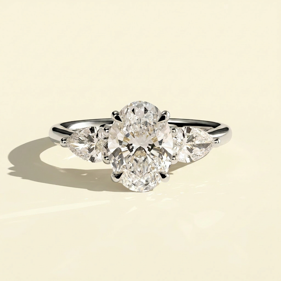 The Ayla - Oval Cut Lab Grown Diamond Three Stone Ring with Pear Side Stones - White Gold