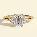The Serene - Emerald Cut Lab Grown Diamond Low Set Solitaire with Round Shoulder Stones Engagement Ring
