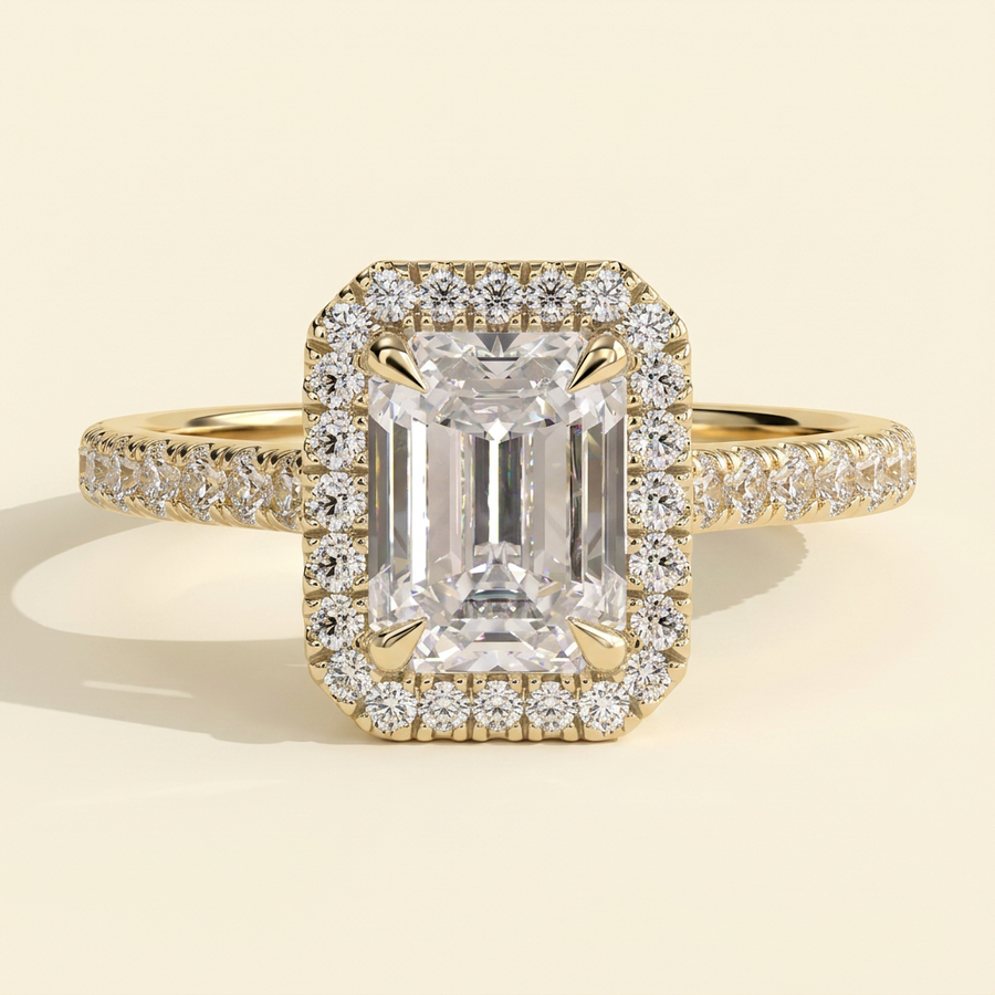 The Delara - Emerald Cut Lab Grown Diamond Four Claw Halo Engagement Ring with Pave Band - Yellow Gold