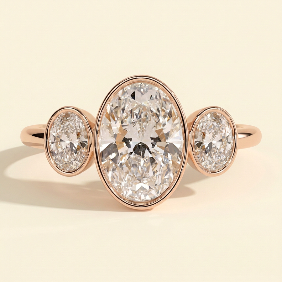 The Xiela - Oval Cut Lab Grown Diamond Three Stone Engagement Ring with Bezel Set Oval Side Stones - Rose Gold