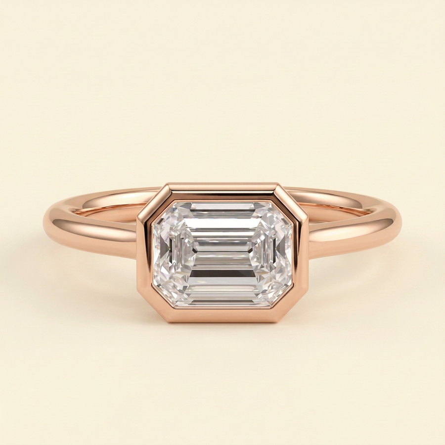 The Zaia - Emerald Cut Lab Grown Diamond East West Bezel Set Solitaire with Open Cathedral Setting Engagement Ring - Rose Gold