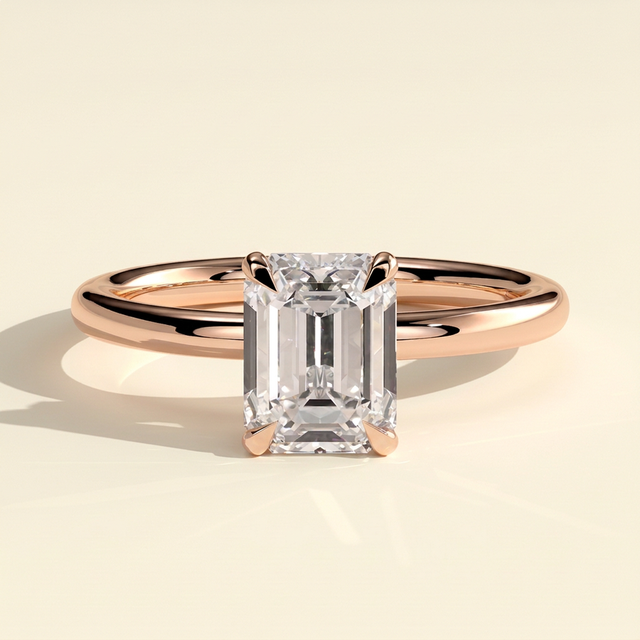 The Izara - Emerald Cut Lab Grown Diamond Four Claw Solitaire with Wrap Around Hidden Halo Engagement Ring - Rose Gold