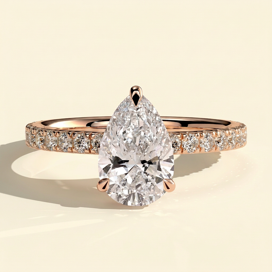 The Hestia - Pear Cut Lab Grown Diamond Wrap Around Hidden Halo Solitaire with Pave Band Engagement Ring - Rose Gold