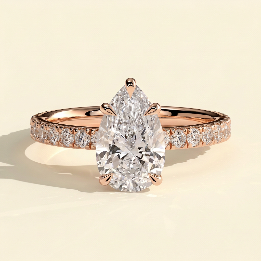 The Estella - Pear Cut Lab Grown Diamond Solitaire with Pave Band Engagement Ring