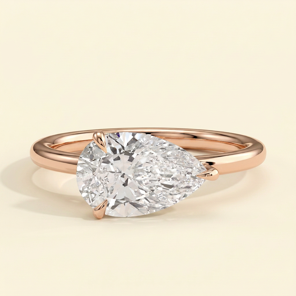 The Riona - Pear Cut Lab Grown Diamond East West Solitaire with Raised Basket Gallery Engagement Ring