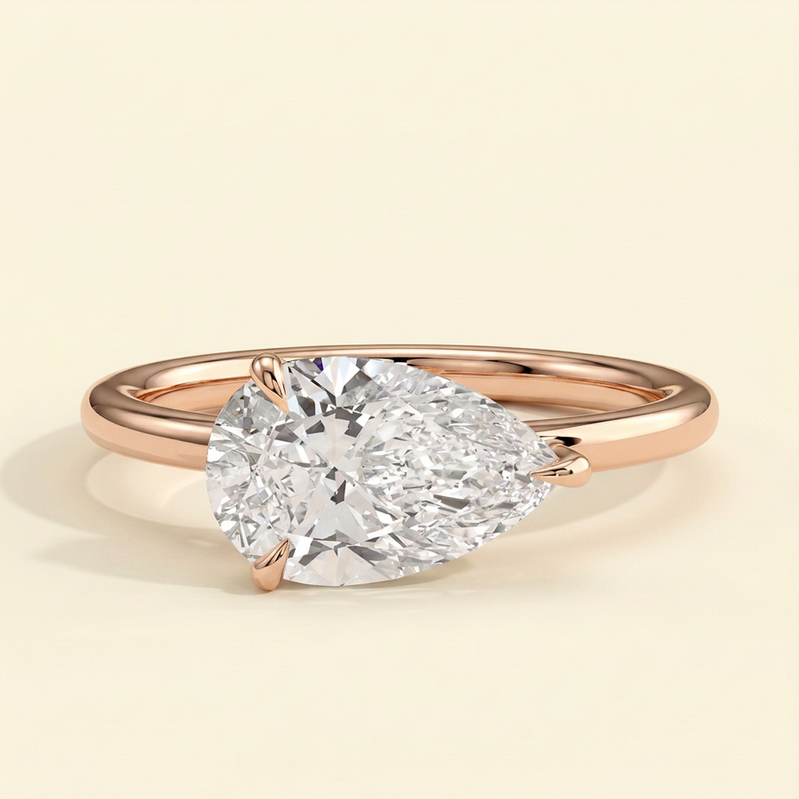 The Riona - Pear Cut Lab Grown Diamond East West Solitaire with Raised Basket Gallery Engagement Ring - Rose Gold