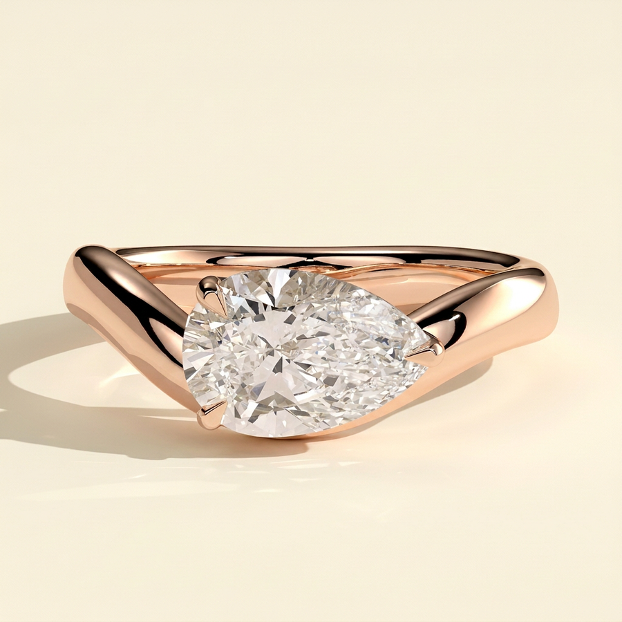 The Celina - Pear Cut Lab Grown Diamond East West Solitaire with Wave Band Engagement Ring - Rose Gold