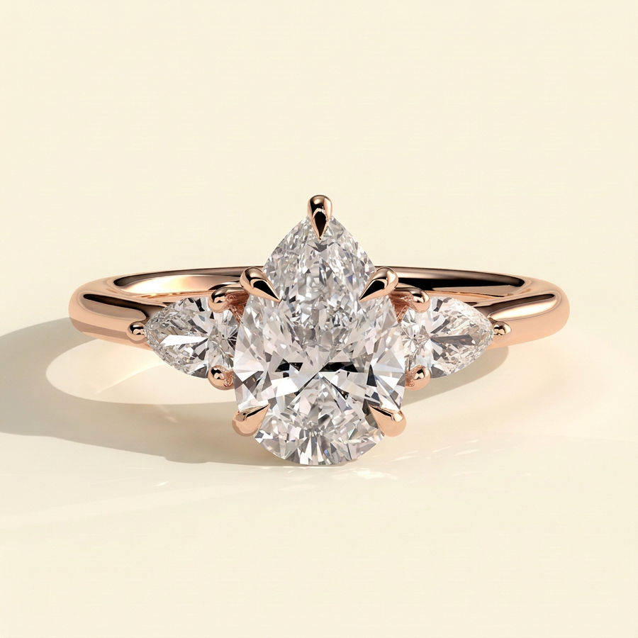 The Viorela - Pear Cut Lab Grown Diamond Three Stone Engagement Ring with Pear Side Stones and Floating Cathedral Setting - Rose Gold