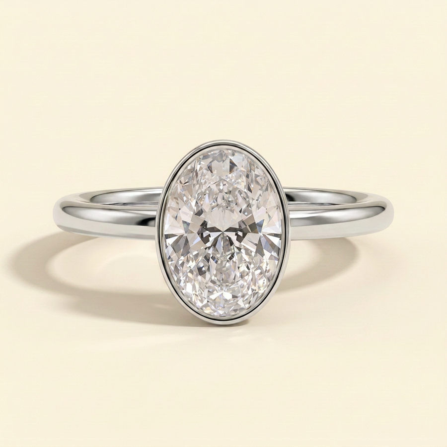 The Uriela - Oval Cut Lab Grown Diamond Bezel Set Solitaire Engagement Ring - White Gold