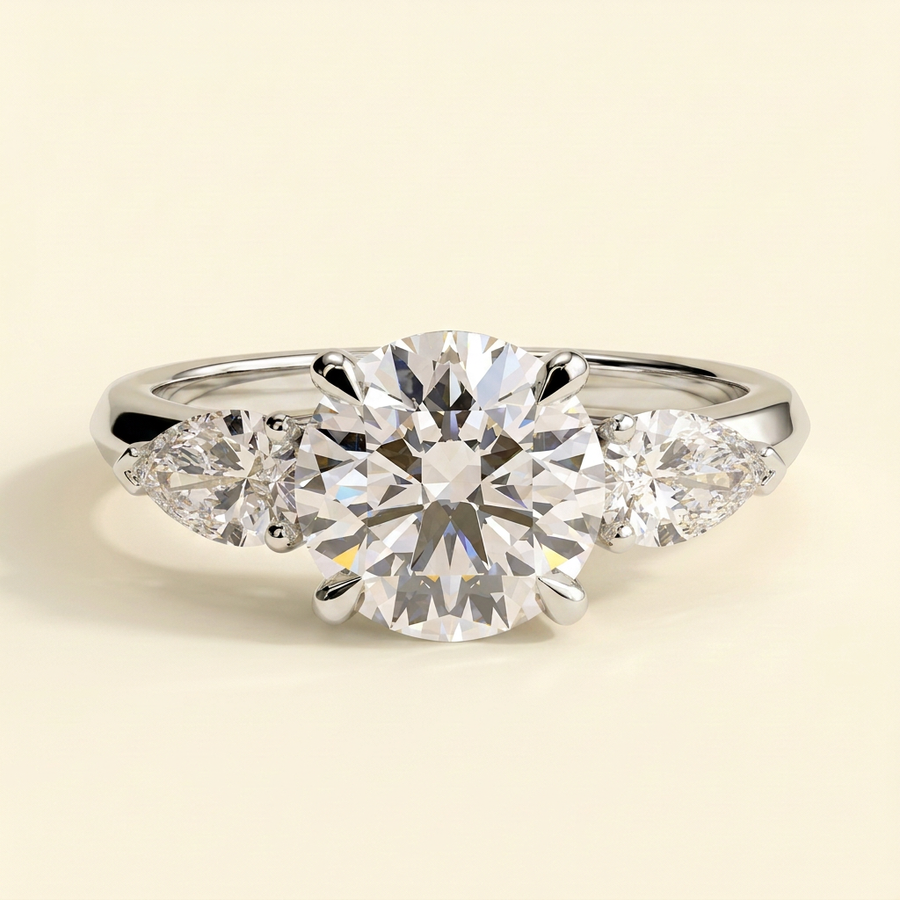 The Regalia - Round Cut Lab Grown Diamond Three Stone Engagement Ring with Pear Side Stones - White Gold