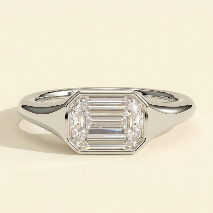 The Joia - Emerald Cut Lab Grown Diamond East West Bezel Set Solitaire with Signet Band Engagement Ring - White Gold