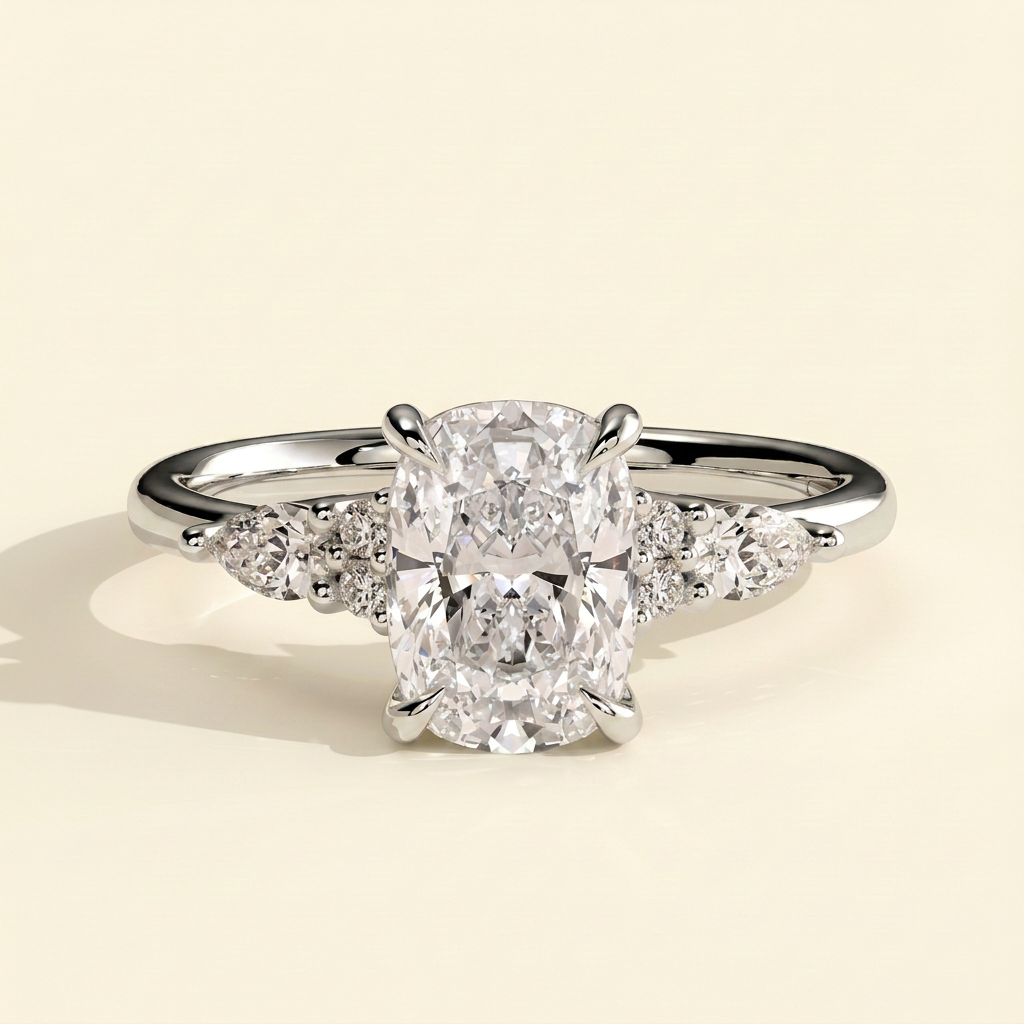 The Verelle - Elongated Cushion Cut Lab Grown Diamond Three Stone Engagement Ring with Pear and Round Side Stones