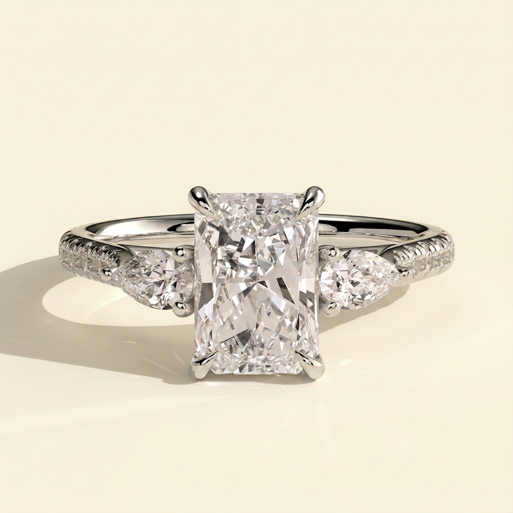 The Riviera - Radiant Cut Lab Grown Diamond Trilogy Ring with Pear Side Stones and Pave Band
