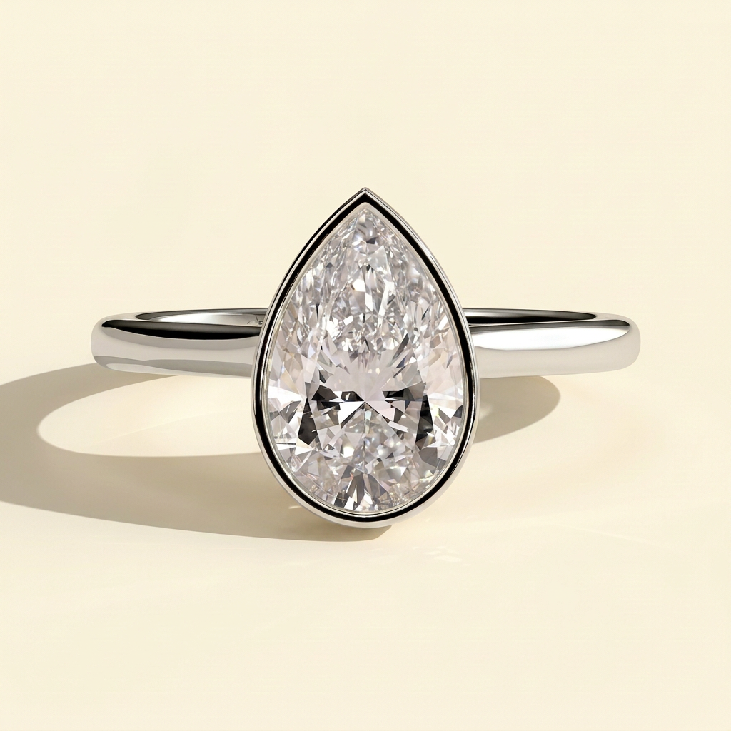 The Viviane - Pear Cut Lab Grown Diamond Deep Bezel Hidden Halo Engagement Ring