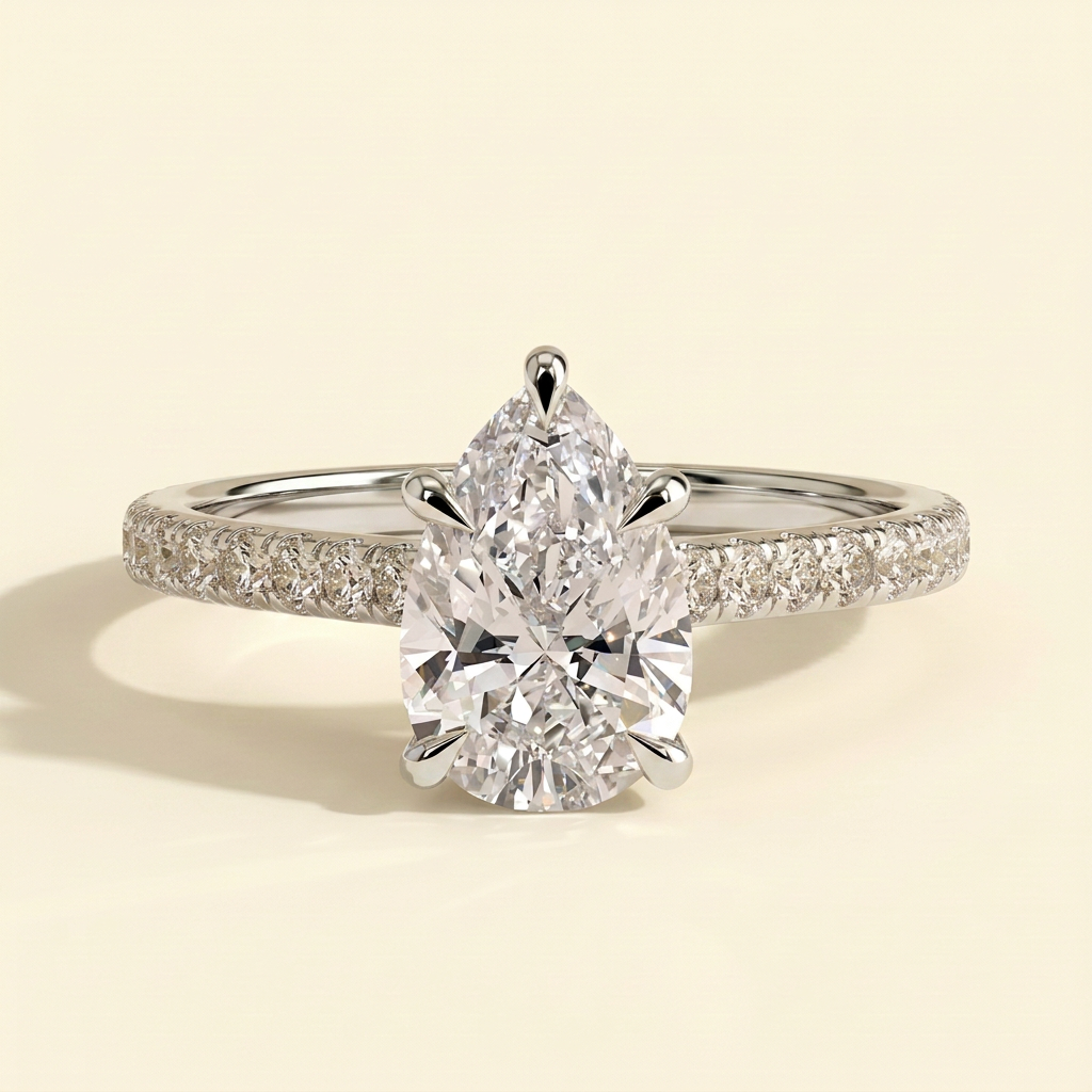 The Margaux - Pear Cut Lab Grown Diamond Five Claw Cathedral Solitaire with Pave Band Engagement Ring
