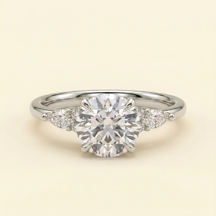 The Clea - Round Cut Lab Grown Diamond Three Stone with Pear Shoulder Stones and Tulip Gallery Engagement Ring - White Gold
