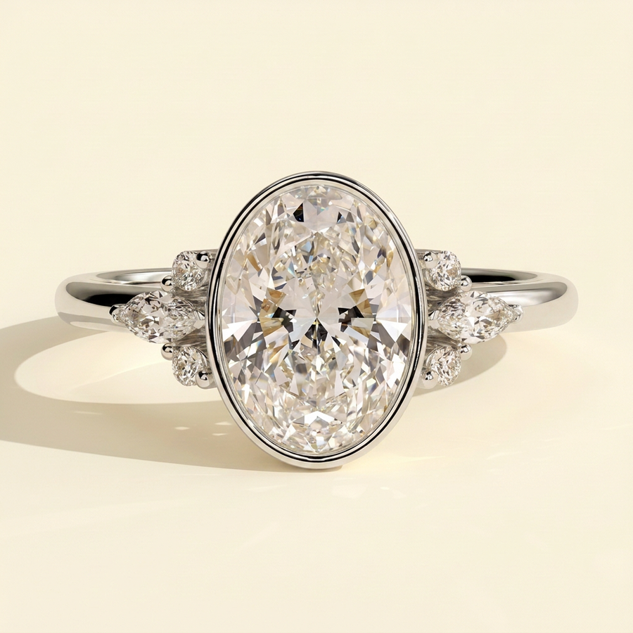 The Ziva - Oval Cut Lab Grown Diamond Bezel Set Solitaire with Marquise and Round Shoulder Stones Engagement Ring - White Gold
